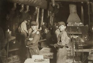 Night shift workers in a glass factory